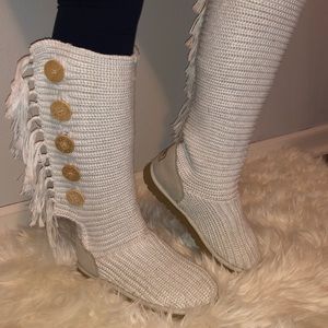 White Uggs with fringe on the sides!